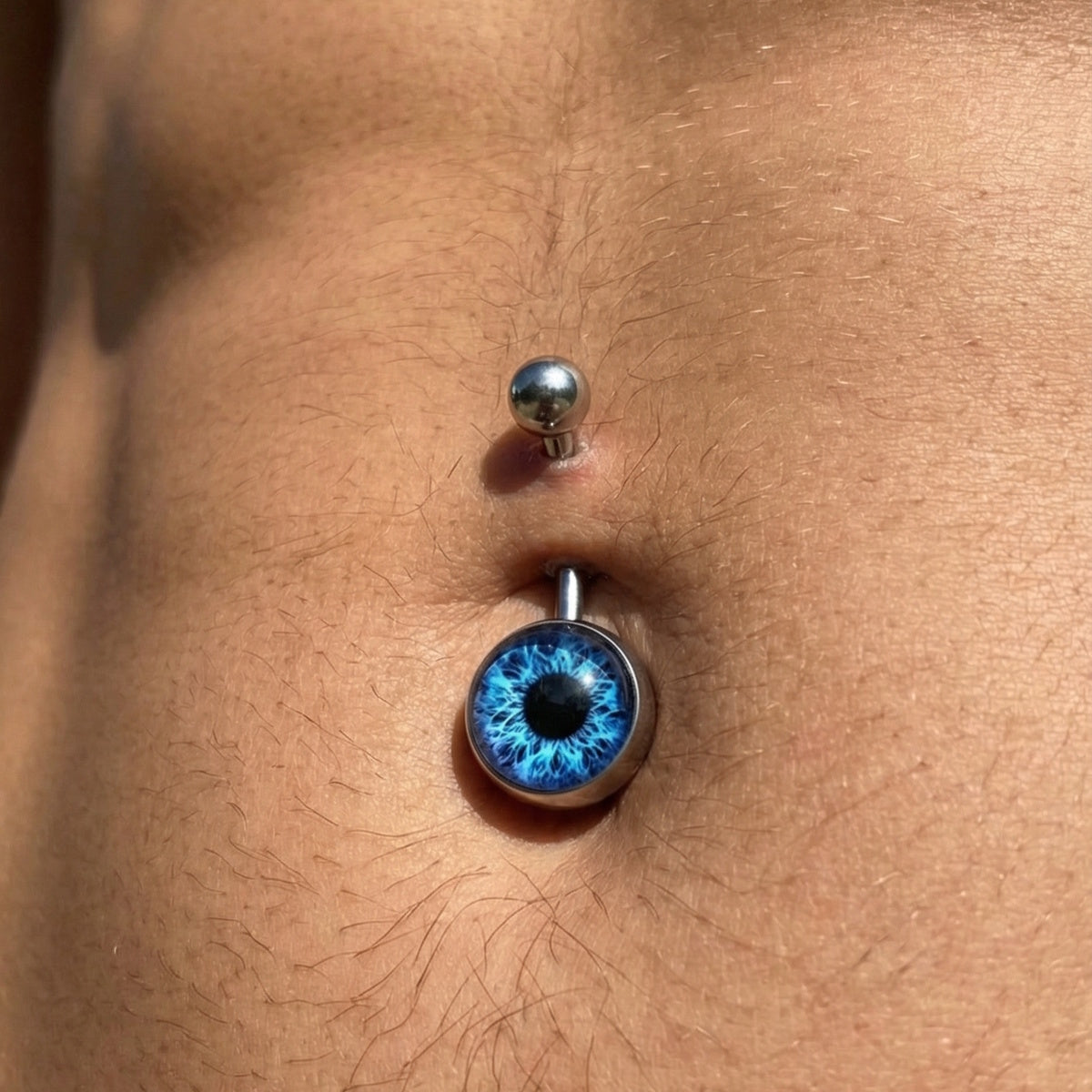 Blue yeball Belly Button Ring 14G 316L Surgical Steel on a male model.