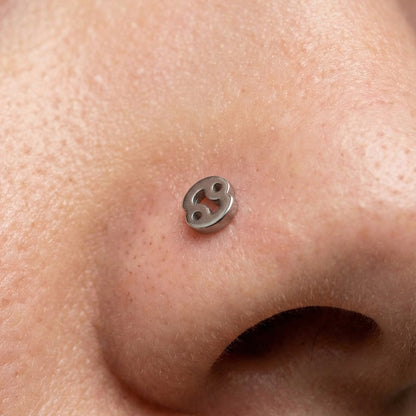 Cancer Zodiac L Bend Nose Stud 20G 1/4" 316L Surgical Steel Nose Ring in silver on a model.
