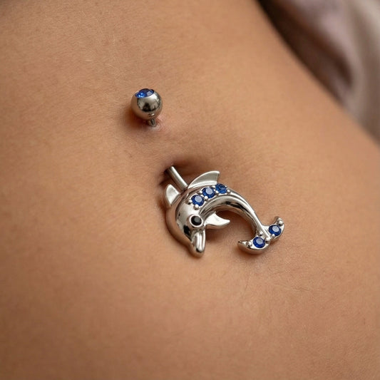 Dolphin Blue CZ Belly Ring 14G 316L Surgical Steel on female model.
