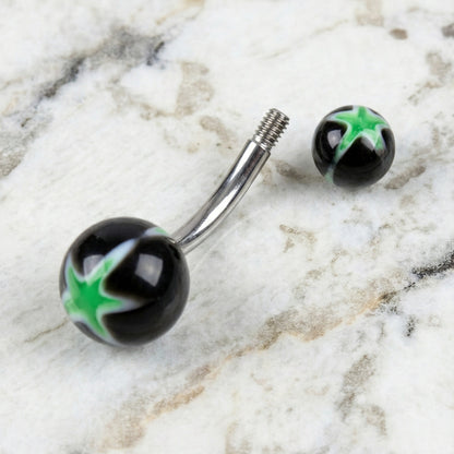 Marijuana Leaf Belly Ring 14G 316L Surgical Steel Acrylic balls on a white countertop.