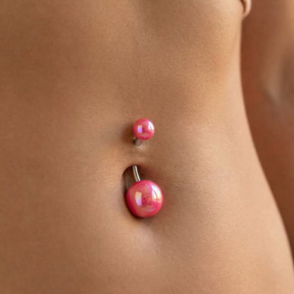 Pink Iridescent Pearlescent Shimmer Belly Ring 14G 316L Surgical Steel on a female model.